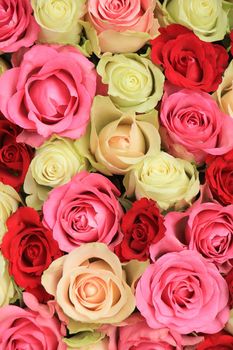 Big pink mixed roses in a floral wedding decoration