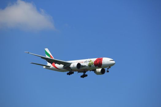 Amsterdam the Netherlands - July 9th 2017: A6-EFL Emirates Boeing 777 approaching Schiphol Amsterdam Airport Kaagbaan runway, Red Rose livery