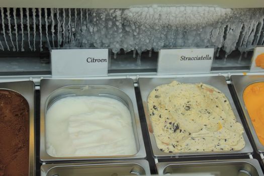 Assorted ice cream flavours on display in a shop