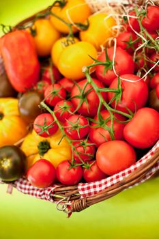 Various kinds of tomato in a wicker basket