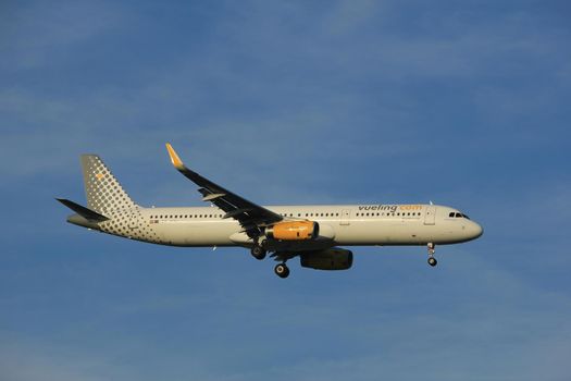 Amsterdam the Netherlands - July 7th 2017: EC-MQL Vueling Airbus A321 approaching Schiphol Amsterdam Airport Polderbaan runway