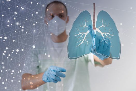 The doctor looks at the hologram of Lungs, checks the test result on the virtual interface and analyzes the data. Pneumonia, donation, innovative technologies, medicine of the future