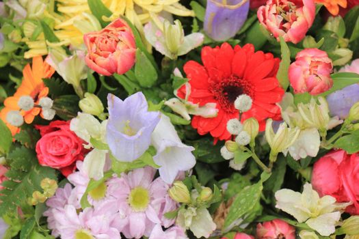 Multi colored wedding flowers in a decorative arrangement