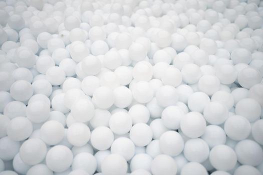 Many white plastic balls for dry pool in amusement park