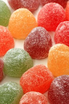 Sugared fruit candy in different shapes, colors and sizes