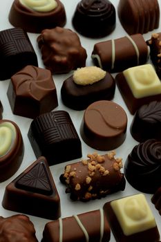 Luxurious chocolates in various shapes and colors