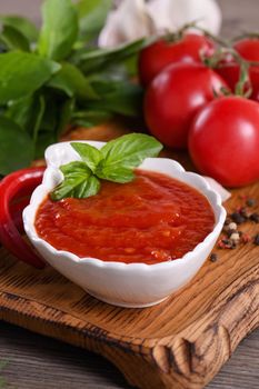 Traditional classic homemade tomato sauce with spices and herbs. Fragrant dressing for various dishes. Taste and simplicity.