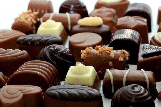 Luxurious chocolates in various shapes and colors