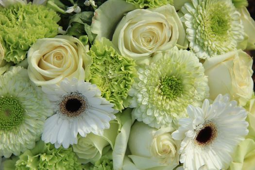 Mixed white wedding flowers, gerberas and roses