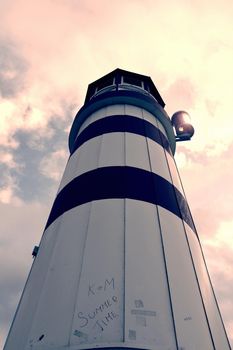 Lighthouse in Lake Neusiedl at sunset. The well known lake with excelent conditions for kiteboarders