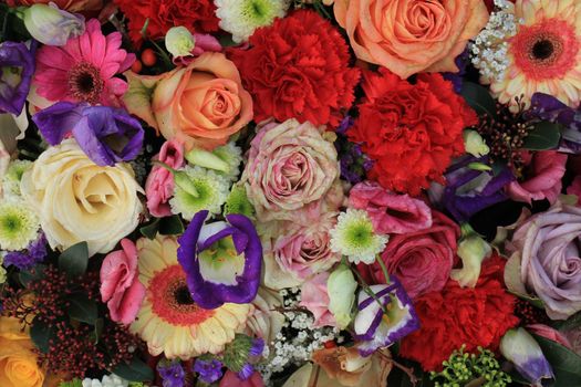 Mixed flower arrangement: various flowers in different colors for a wedding