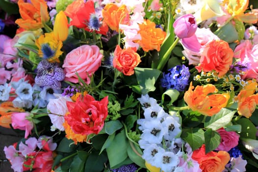 Mixed flower arrangement: various flowers in different colors for a wedding