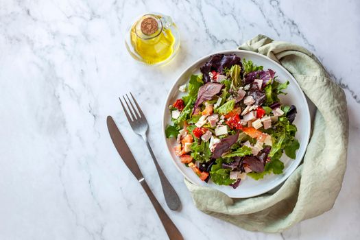 portion of bacon, tomato, cheese and bell pepper salad, top view, copy space