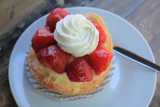 Fresh strawberry confectionery, outside on a table