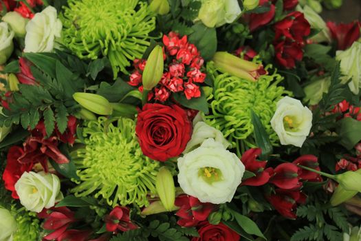 Classic green,  red and white bouquet for a wedding