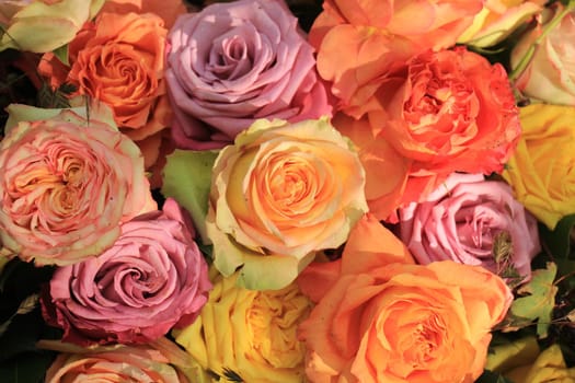 Multicolored roses in a floral wedding decoration