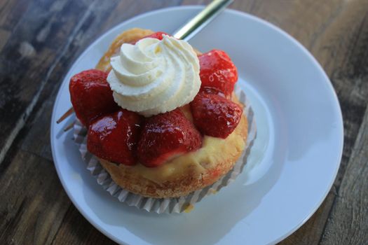 Fresh strawberry confectionery, outside on a table