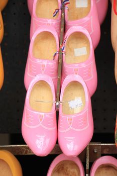 Colorful painted clogs, the traditional Dutch wooden shoes in a tourist shop