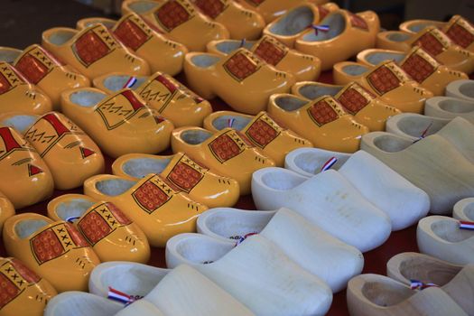 Dutch wooden clogs at a market stall, traditional shoes