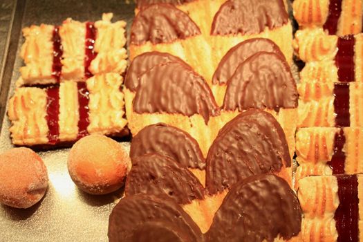 Fresh confectionery, various cookies with chocolate and jam