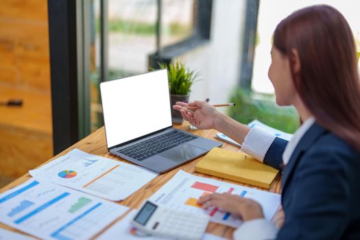 business woman using blank white computer screen.