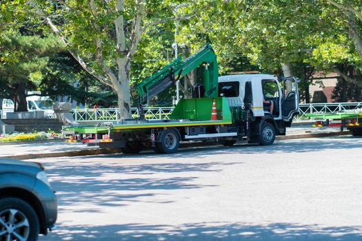 Tow loading truck roadside car broken transportation automobile assistance auto, from vehicle trailer for evacuation from problem pickup, tow department. Towing wreck crash, person