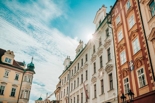 Prague, Czech Republic - July 2022. Beautiful cozy narrow street in old town. Amazing european architecture, historical facades of traditional buildings. High quality photo