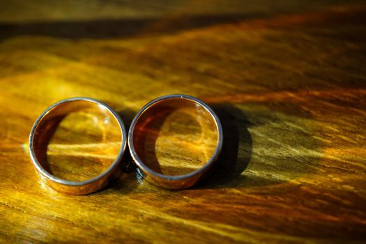 Gold wedding rings for newlyweds on wedding day