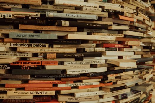 Prague, Czech Republic - July, 2022. Public Municipal Library with colorful paper books on shelves. Education, science, literature concept. High quality photo