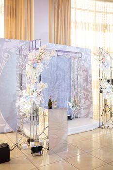 wedding arch with beautiful decorations for newlyweds on the wedding day