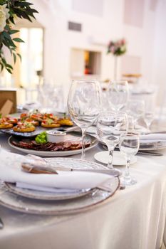 Wedding table for newlyweds with beautiful decorations