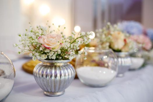 Wedding table for newlyweds with beautiful decorations