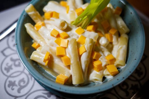 Delicious fresh hard pasta with cheese and herbs.