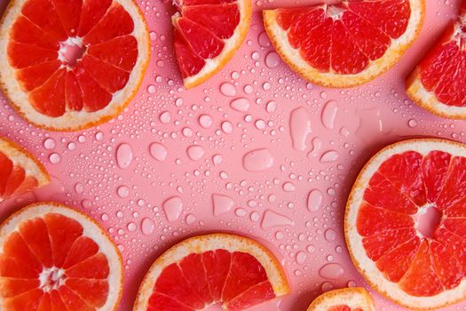 Background with grapefruit and water drops. Selective focus. Spa.