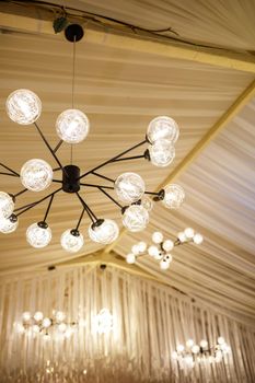 Modern loft chandelier with many shades with energy saving lamps