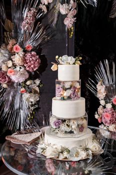 Beautiful tiered delicious dessert sweet cake for newlyweds.