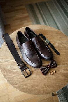 Mens elegant set of stylish groom accessories for wedding day. Men's classic shoes