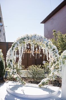 Wedding beautiful arch for the wedding ceremony of the newlyweds