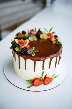 Big sweet wedding cake for newlyweds