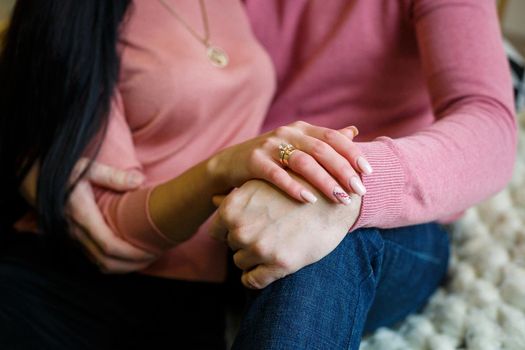 Man and woman hand in hand tenderness love