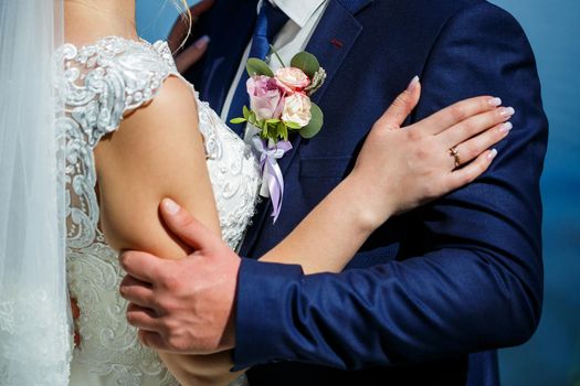 Bride and groom hugging on a wedding day