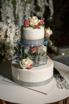 Beautiful tiered delicious dessert sweet cake for newlyweds.