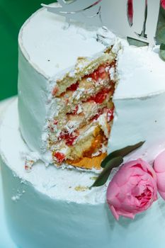 Big sweet wedding cake for newlyweds