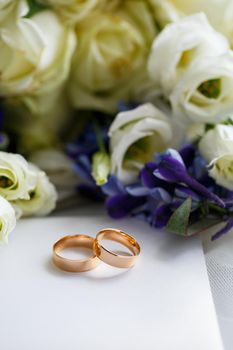 Wedding theme, beautiful wedding rings, bridal bouquet