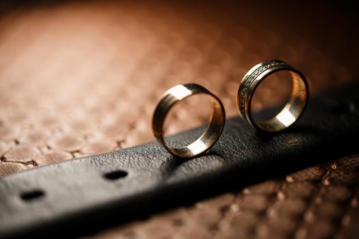 Gold wedding rings for newlyweds on wedding day