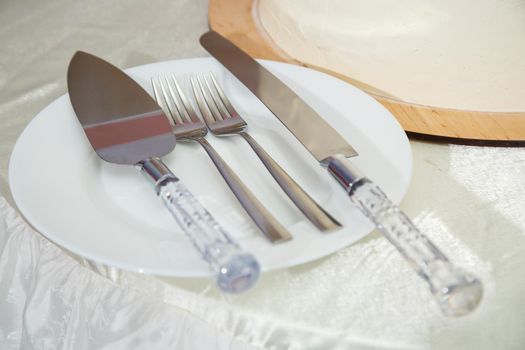 plates and dishes stand on the table for food