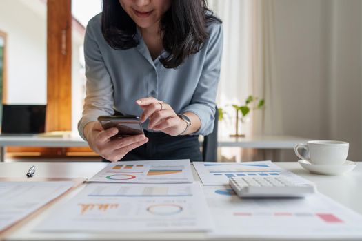 Young business woman completes KYC using an online banking program in order to open a digital savings account. The definition of cyber security