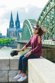 Cologne Koln Germany during sunset, Cologne bridge with the cathedral. beautiful sunset at the Rhine river, happy Asian women visiting Cologne