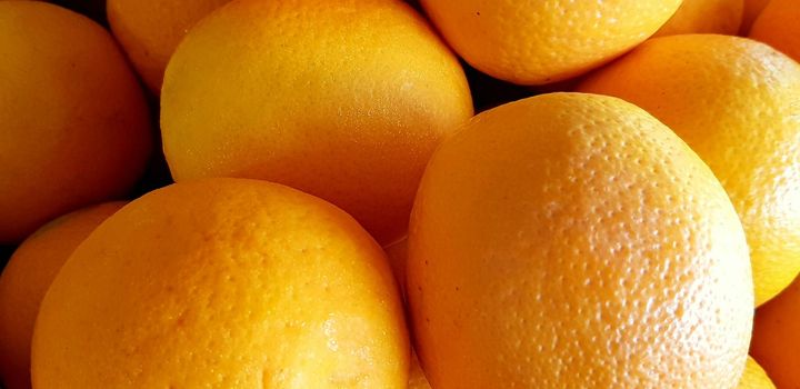 group of fresh orange fruits, tangerine good as background top view