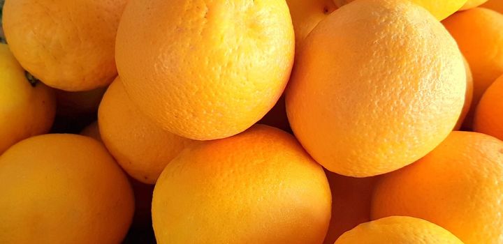 group of fresh orange fruits, tangerine good as background top view